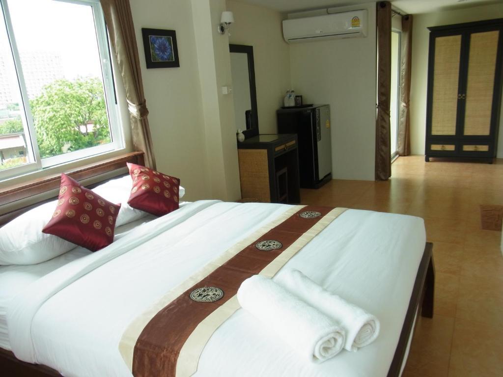 Spa Guest House Praia de Jomtien Quarto foto